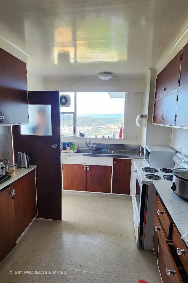 The kitchen—once a cramped and aging space
