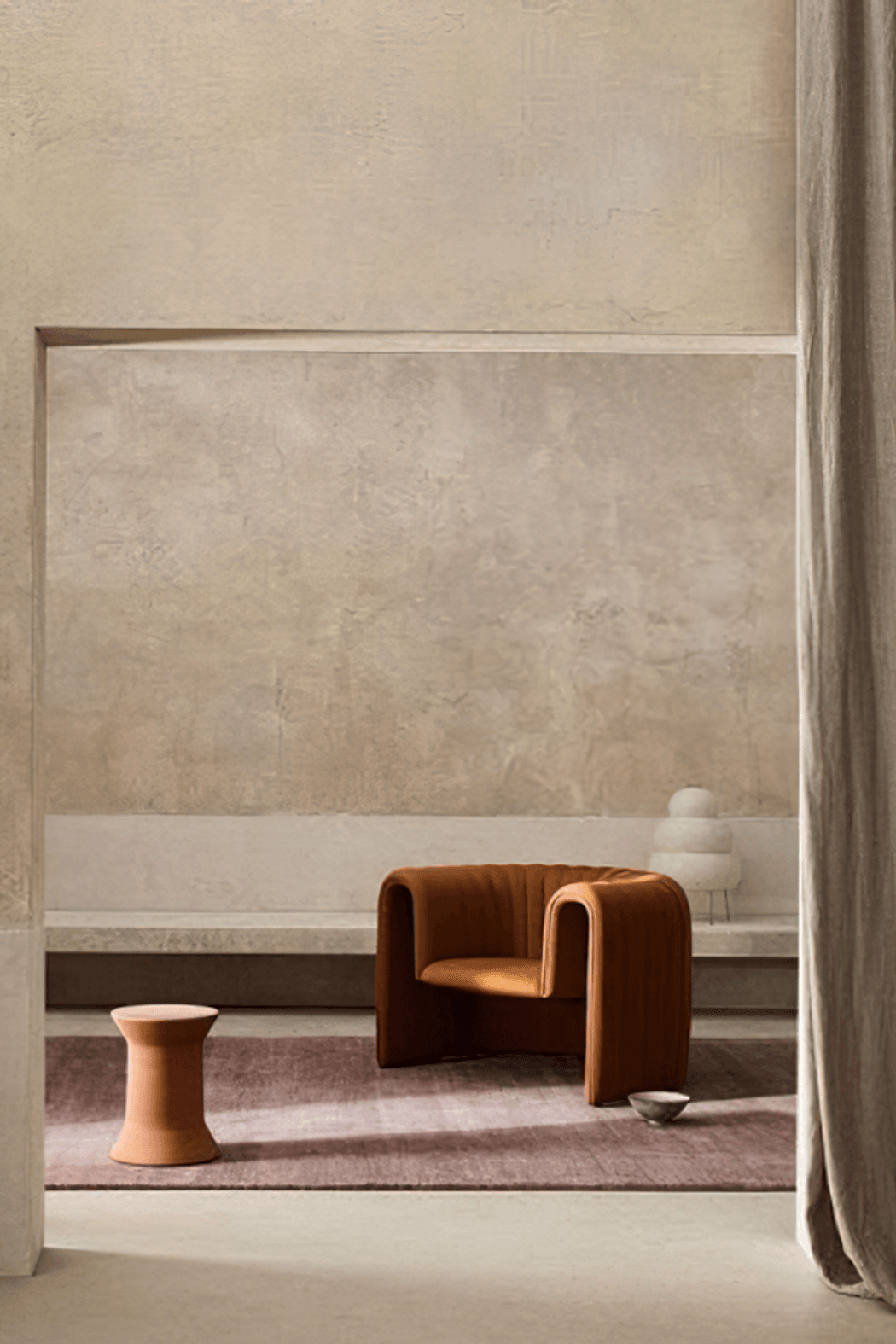 Image Credit:  Armadillo | Warm neutral walls in venetian plaster + organic furniture forms