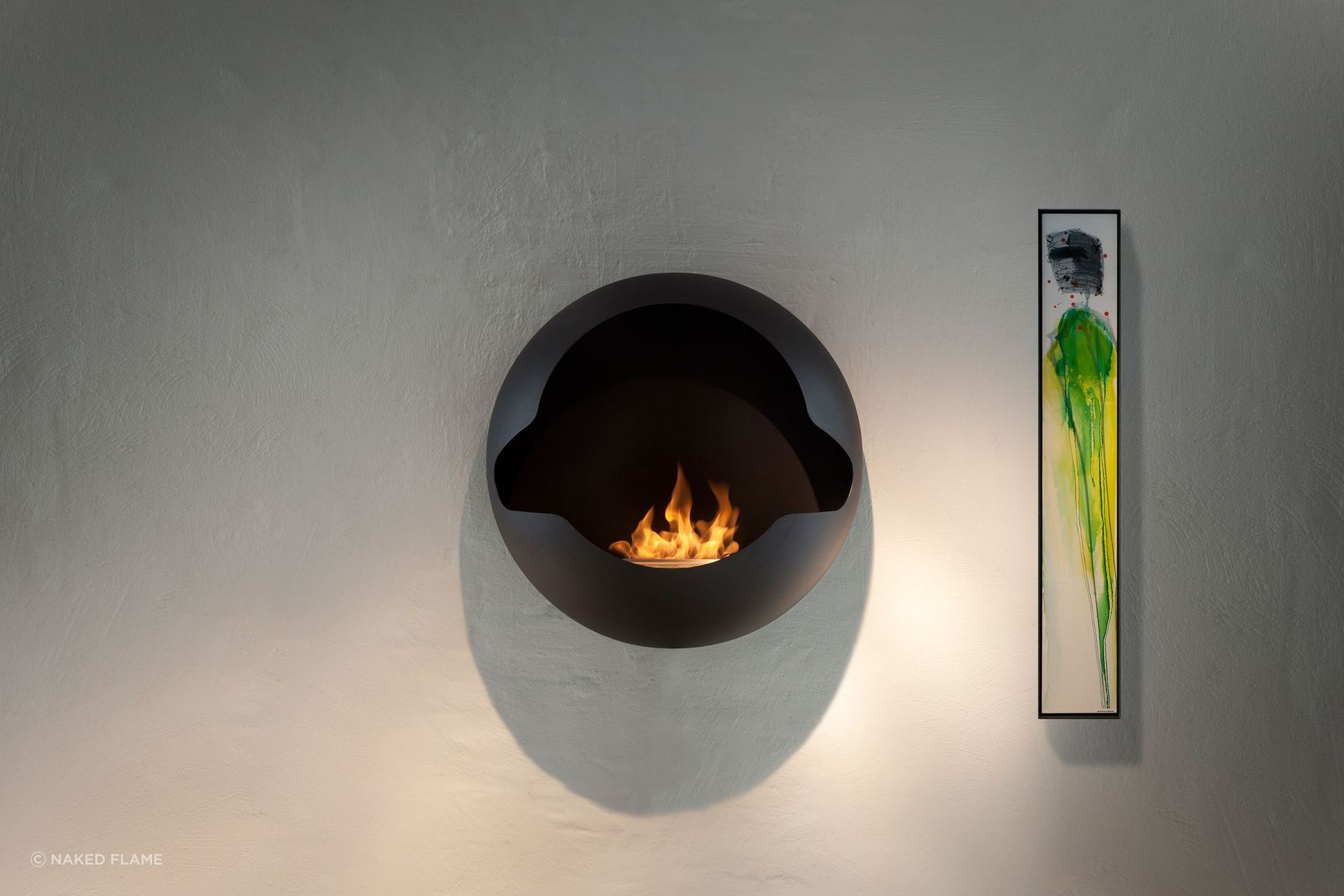 The wall-mounted Vauni Cupola Bioethanol Fireplace shows just how far fireplaces have come in terms of design and features.