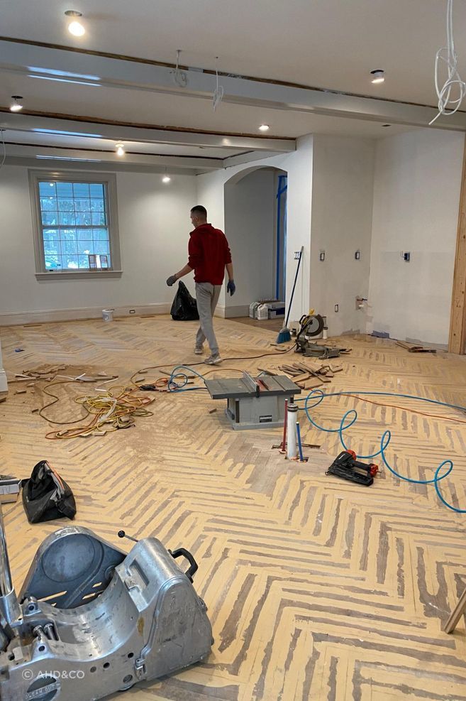 Opening up the kitchen and laying the herringbone flooring was a big job.