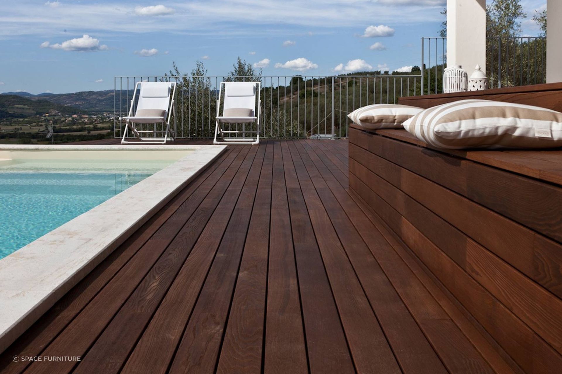 Timber decking can be used around pools.
