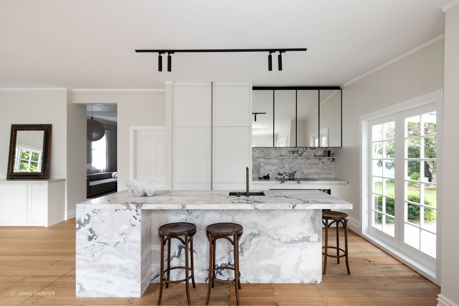 “There’s only so many metres that a working triangle can be for it to stay practical. With new builds getting bigger and bigger, you have to think about how that works in spaces of different sizes,” says Michael.