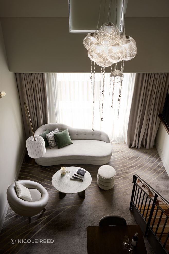 The loft suites have a mezzanine level, with the bedroom upstairs.