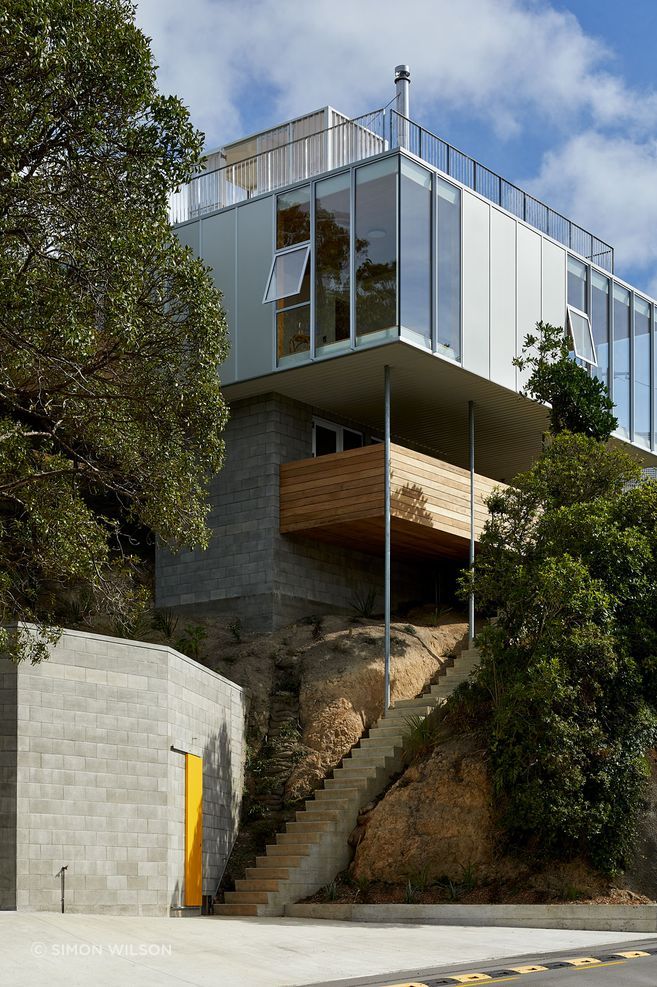 The family home designed by Patchwork Architecture. It was a tricky site, but rocky, which provided a good foundation. “So it's almost totally out of the ground. It's barely dug into the hillside at all,” says Patchwork Architecture's Ben Mitchell-Anyon.