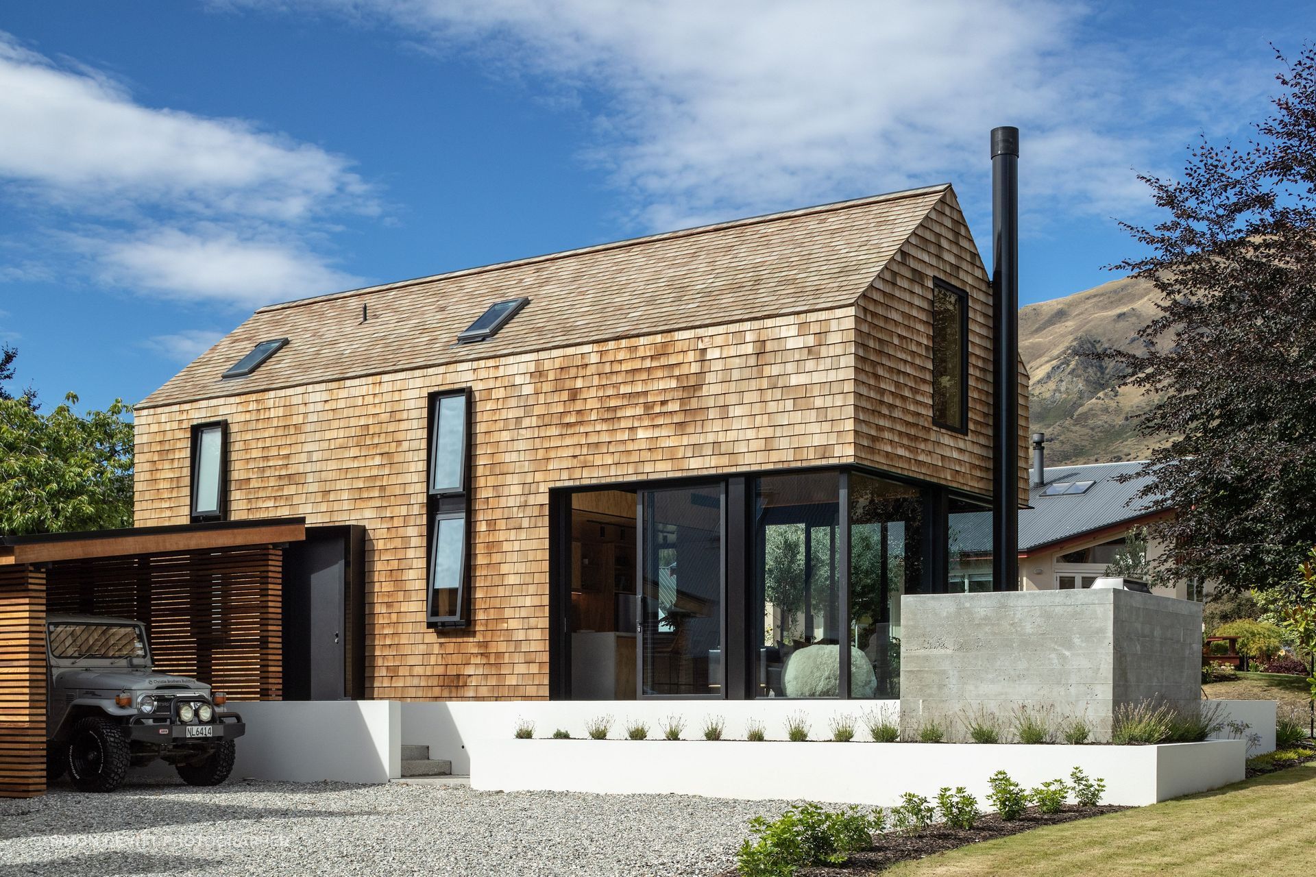 The cedar-shingled tiny house was built on a family-owned section in Wanaka, says Barry Condon of Condon Scott Architects. “The brief was for something that was compact that utilised the space as densely as possible. So I think we delivered on that front.”