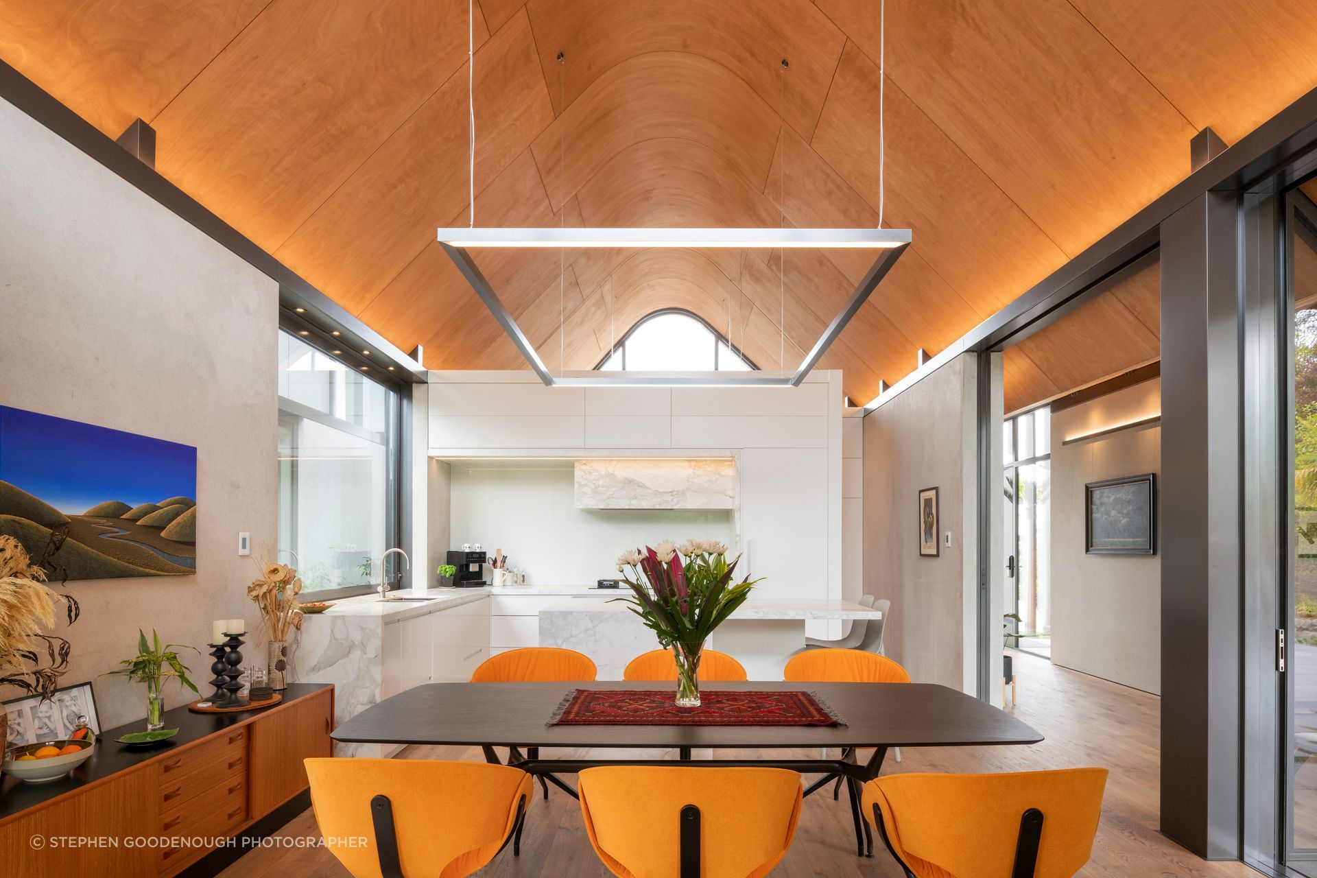 “We always knew that the main focus from an interior point of view was the ceiling shape,” says Craig. “So it was all about lighting the ceiling.” The Manta dining table is from Matisse.