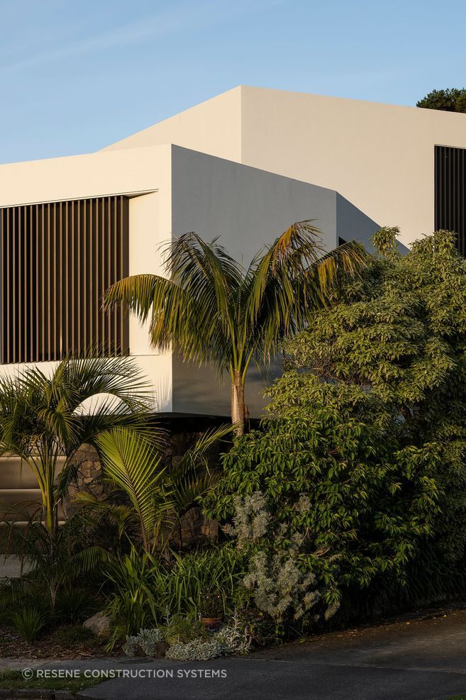 The sculptural street frontage belies the complexity and size of the home.