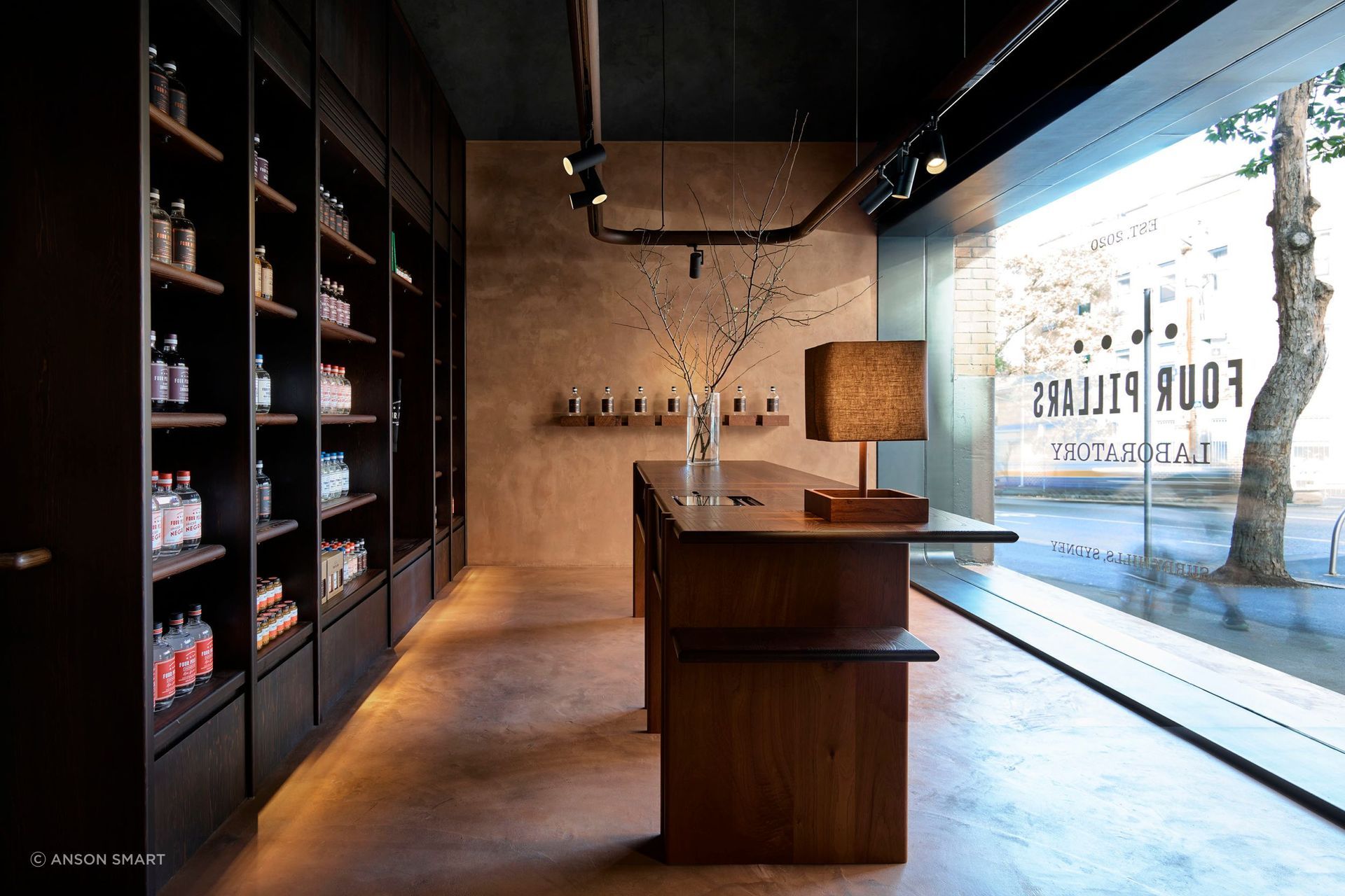 Custom-designed joinery crafted from a blend of Australian hardwoods showcases the Four Pillars' products.