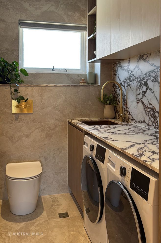 The stone has been used throughout the apartment, continuing the aesthetic.