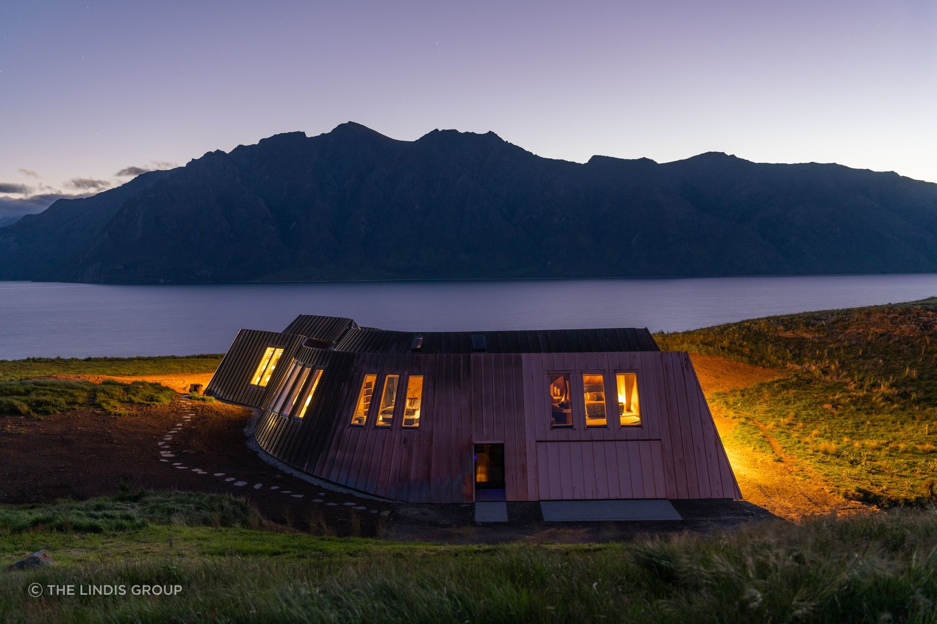 Windows have been placed strategically to allow for views of the mountains and the lake.