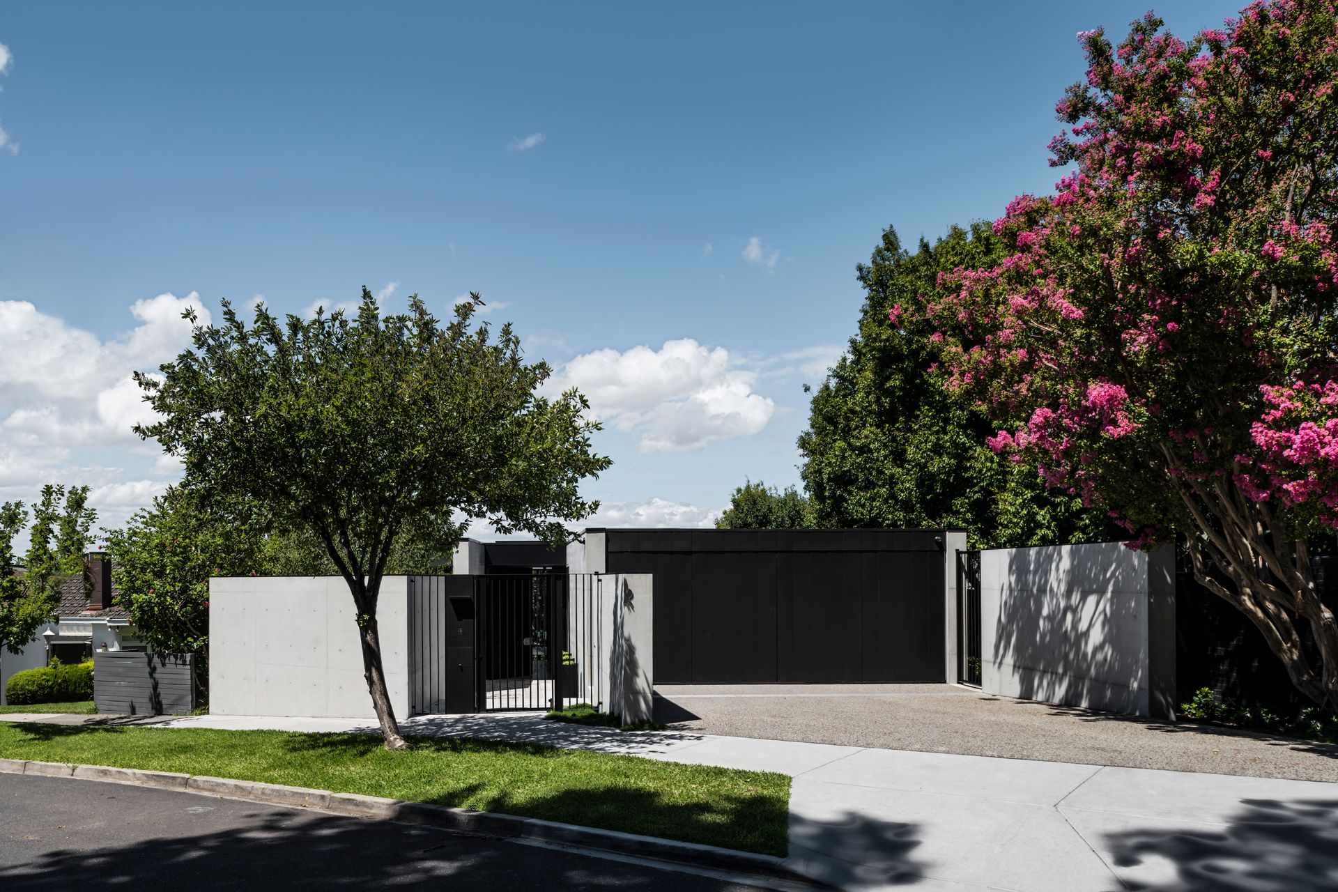 From the street, it reads as a single storey home.
