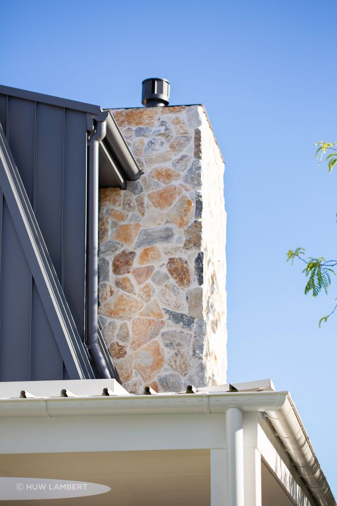 "Natural stone became one of the key devices for anchoring the building to its site and reinforcing the sense of permanence we were seeking."
