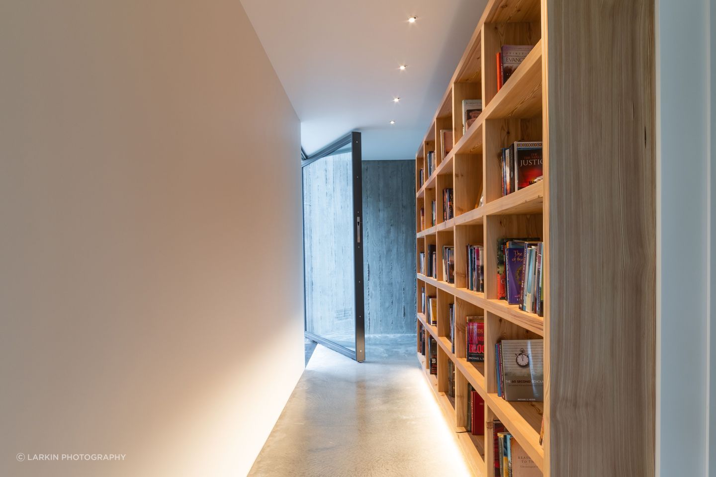 A gallery-style corridor leads through the second and third bedrooms.