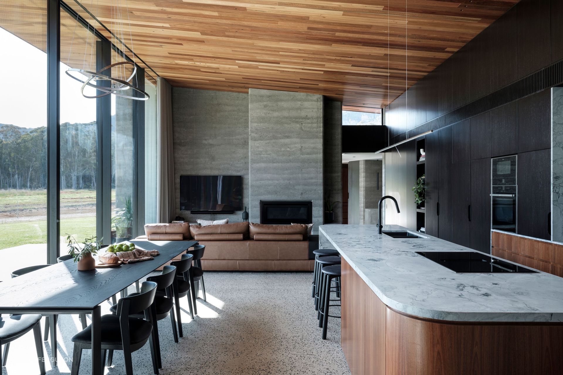 Spotted gum timber veneer lines the ceiling to mimic the cliffs' reflecting light. 