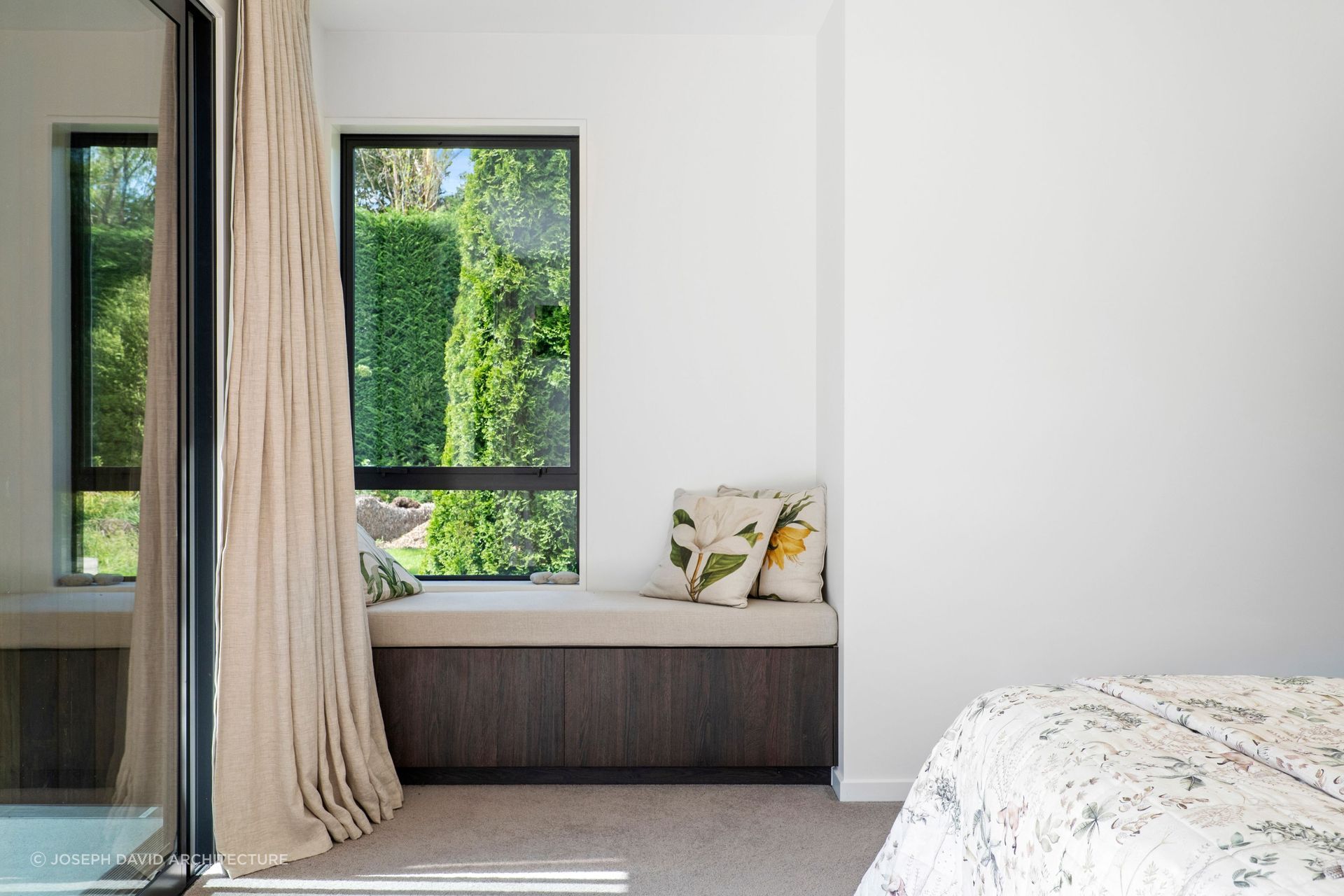 Complete with a built-in window seat, the master suite is a retreat from the rest of the home.