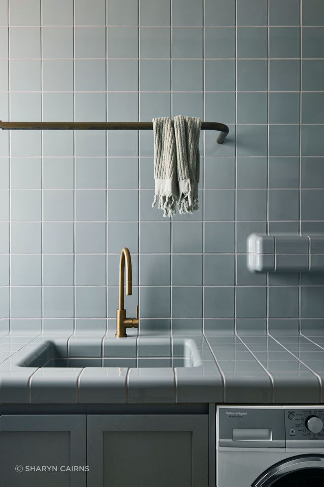 Muted tones in the traditionally tiled laundry.