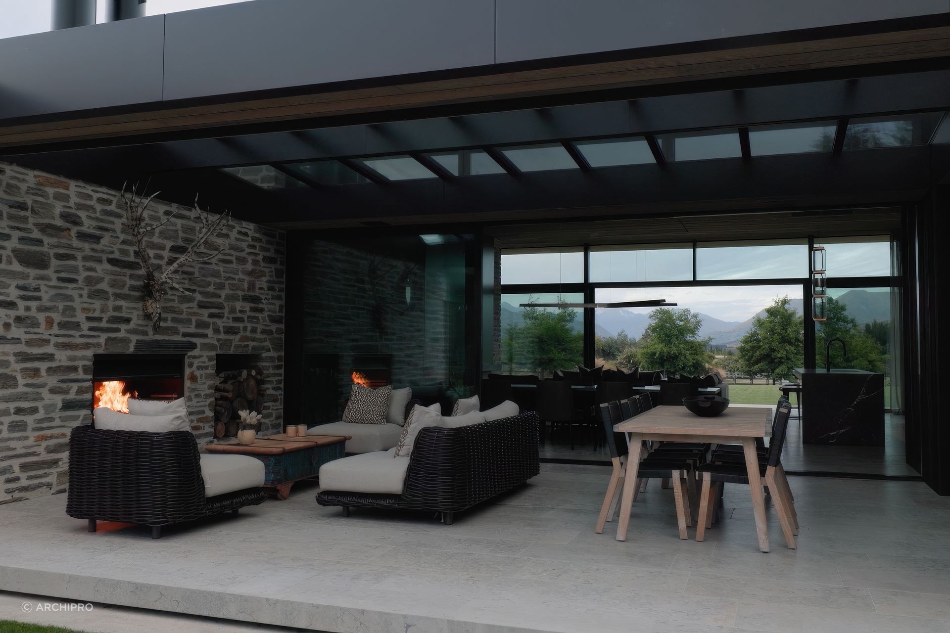 The loggia adjacent to the main living space has a glazed roof and a wind blind that can enclose and protect the space.