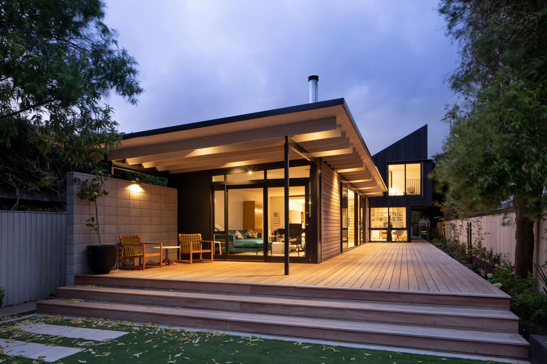 The homeowner wanted the house to feel connected to the outdoors so an ample deck and cantilevered roofline maximises outdoor living opportunities.
