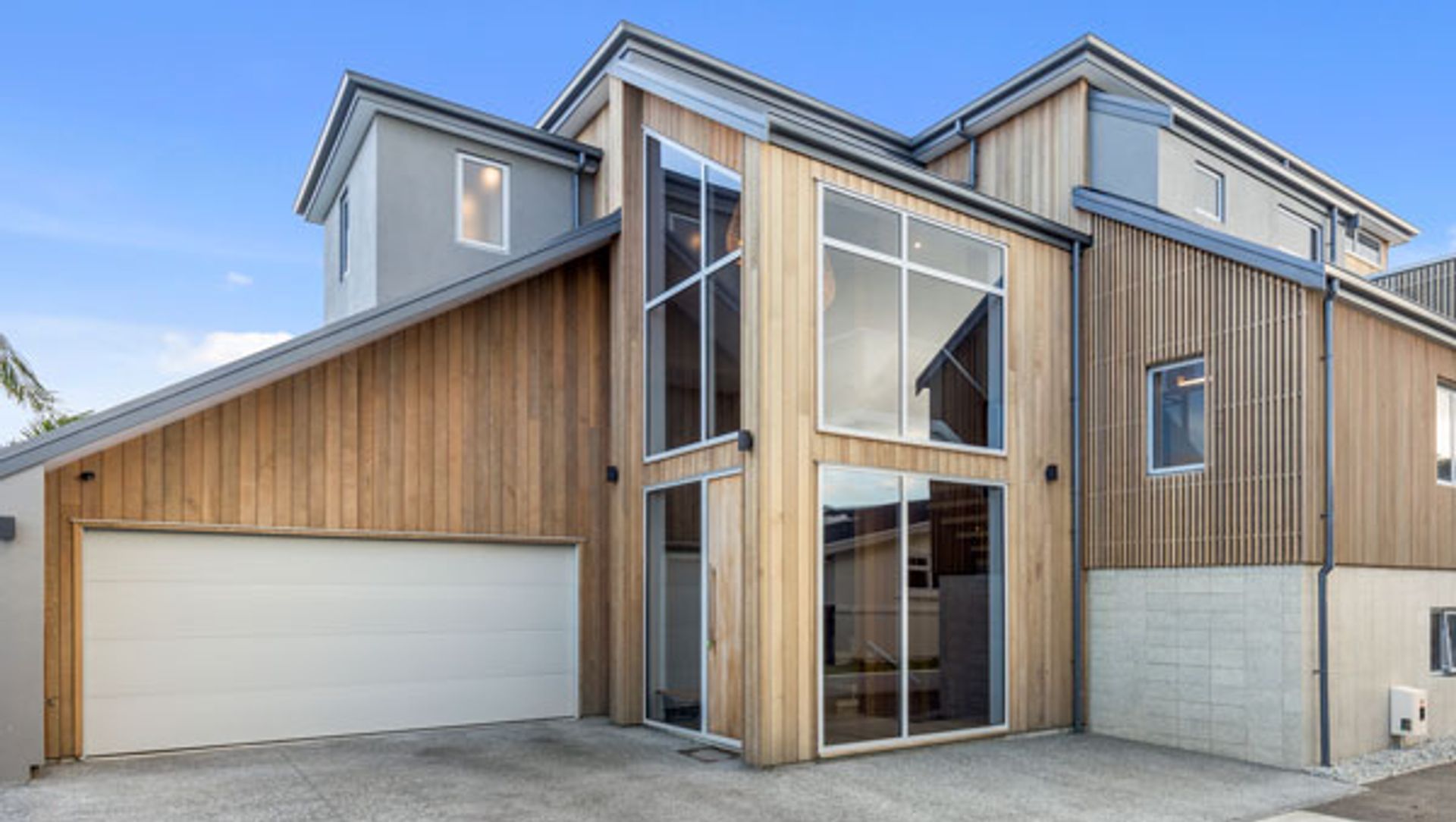 Clad in Cedar timber this Mount Maunganui home sits well in the coastal environment with wonderful water views as the backdrop.