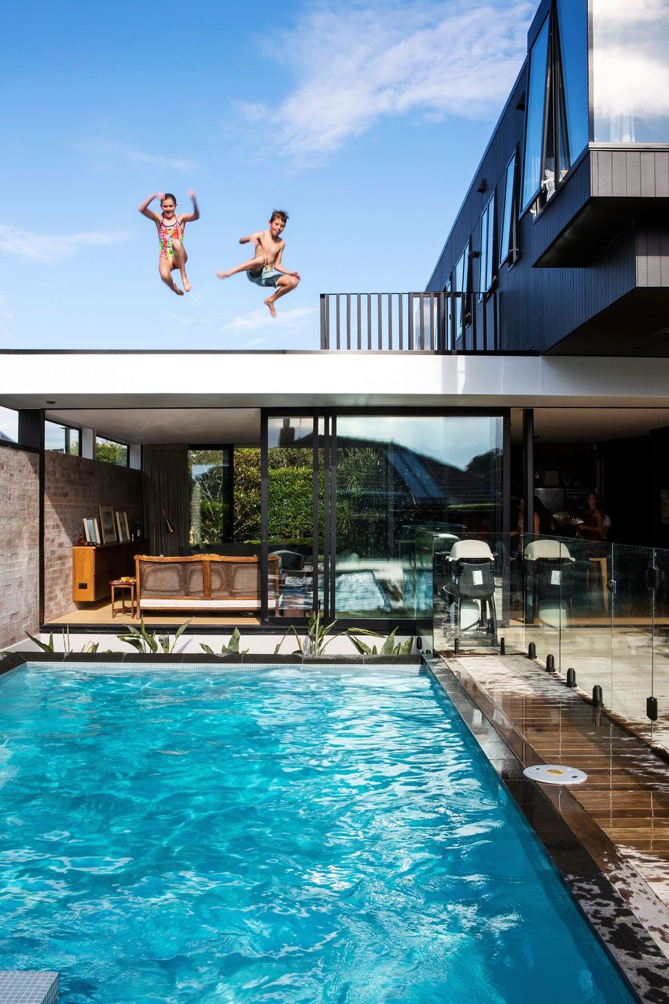 Inspired by the iconic Stahl House* in California, where the kids can jump straight off the roof into the pool.