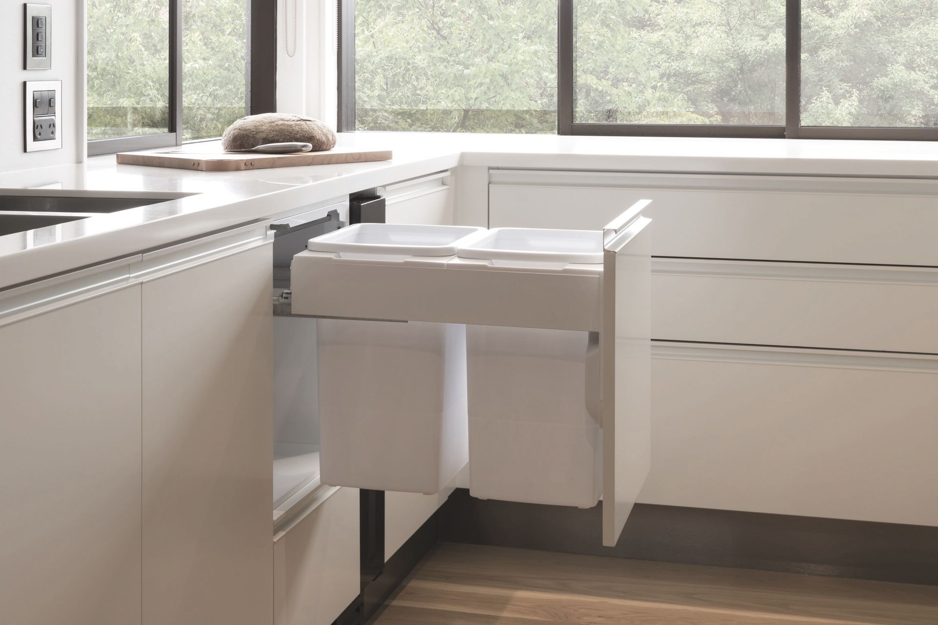 Concelo 2 x 20L Bucket in White, mounted at benchtop height for easy disposal of waste directly from benchtop into the bin,