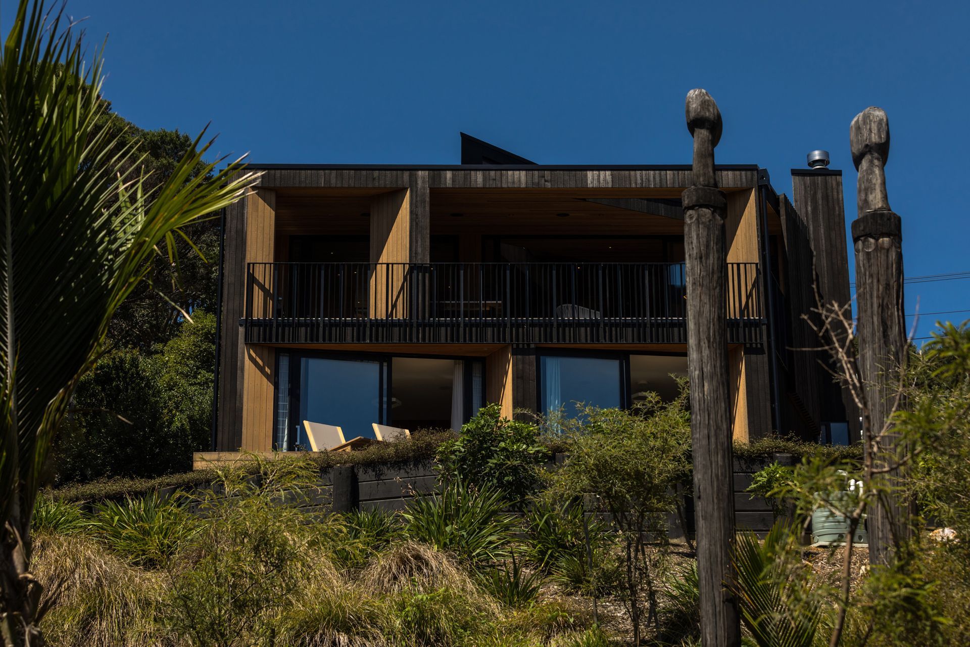 Regenerative planting of natives further serves to integrate the structure into its site.