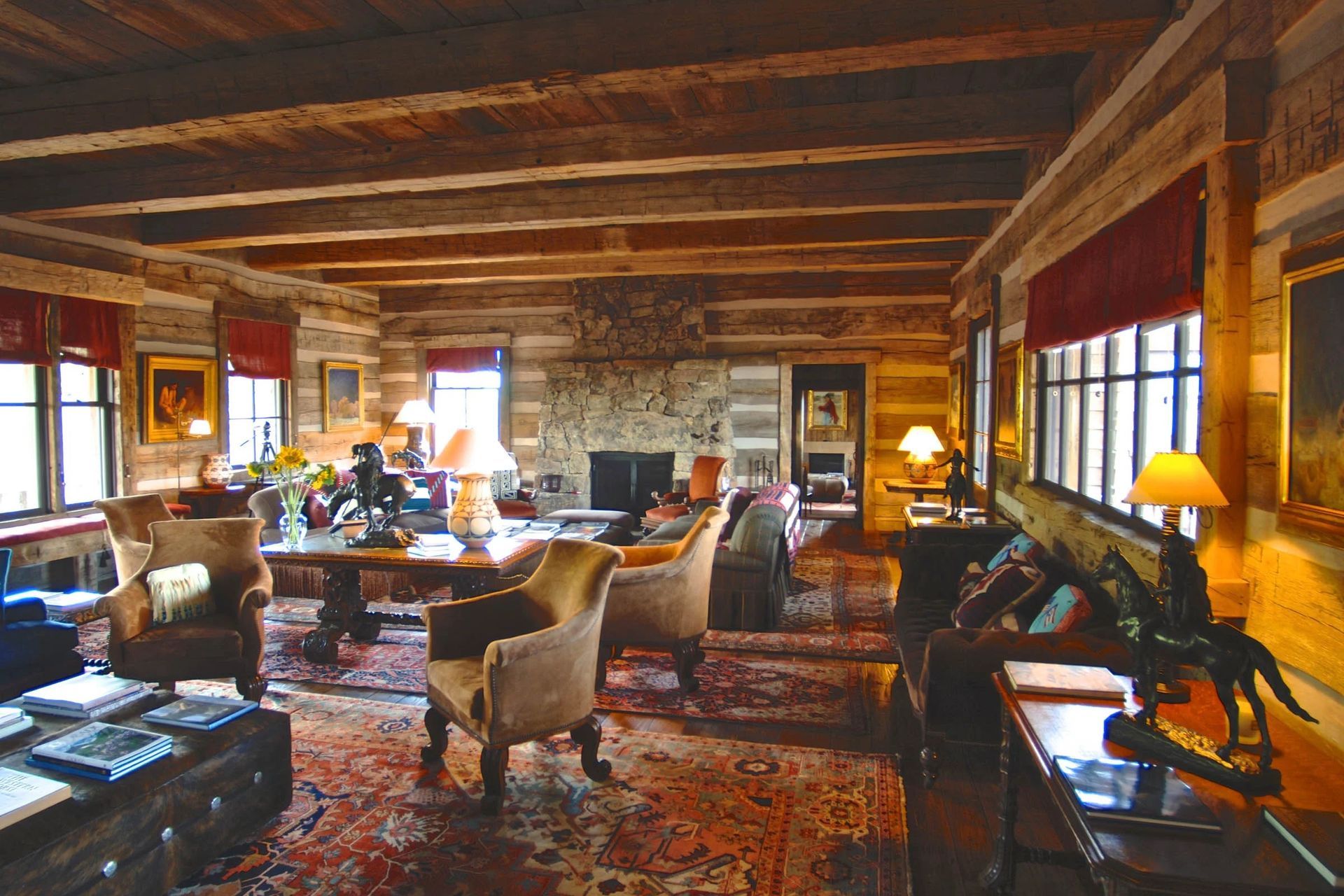 mt-sopris-ranch-living-room-stone-fireplace-reclaimed-logs-ap-compressed.jpg