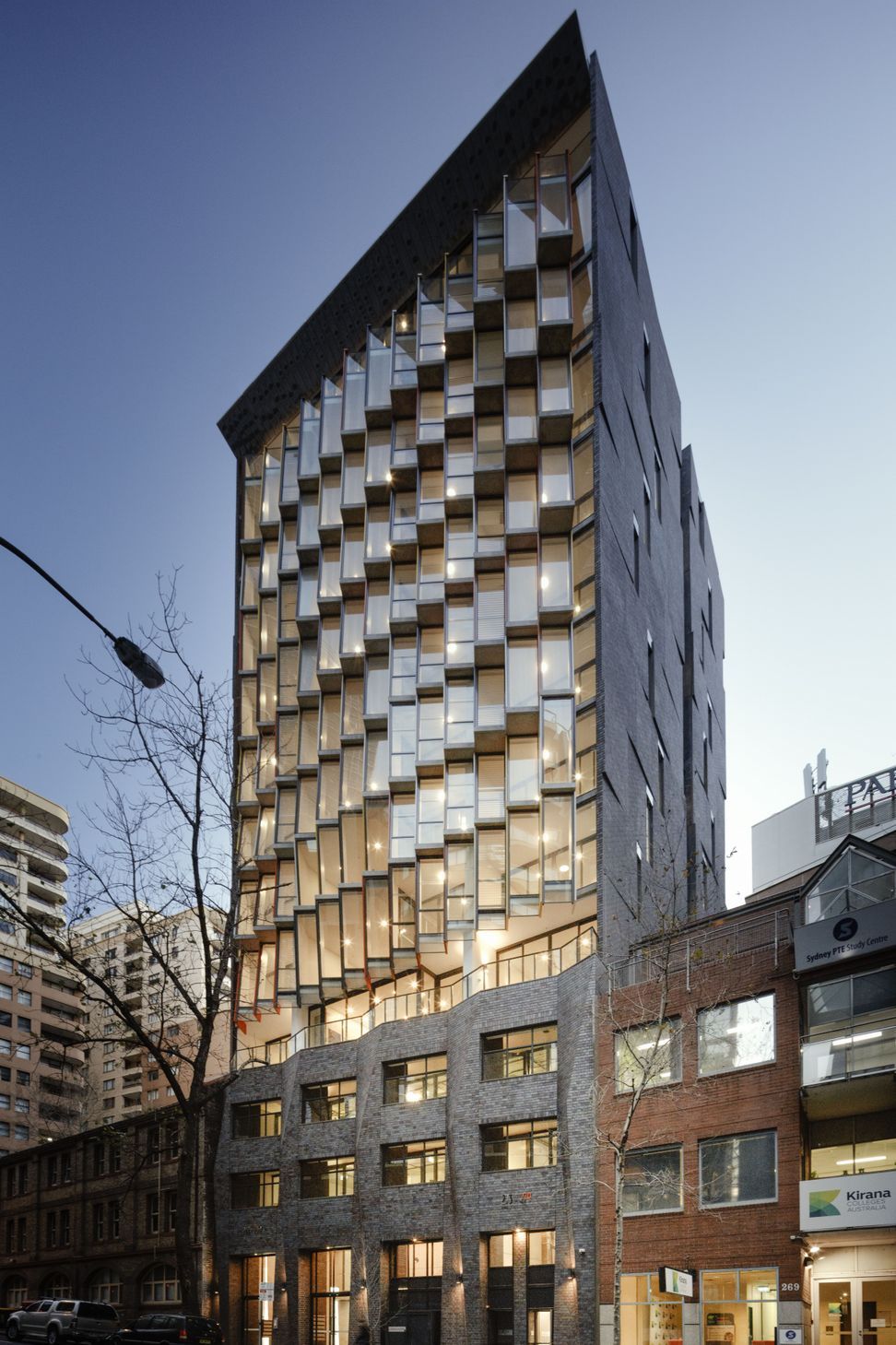 The stunning angled brick inlay facade and brick podium - every brick face is sculptured