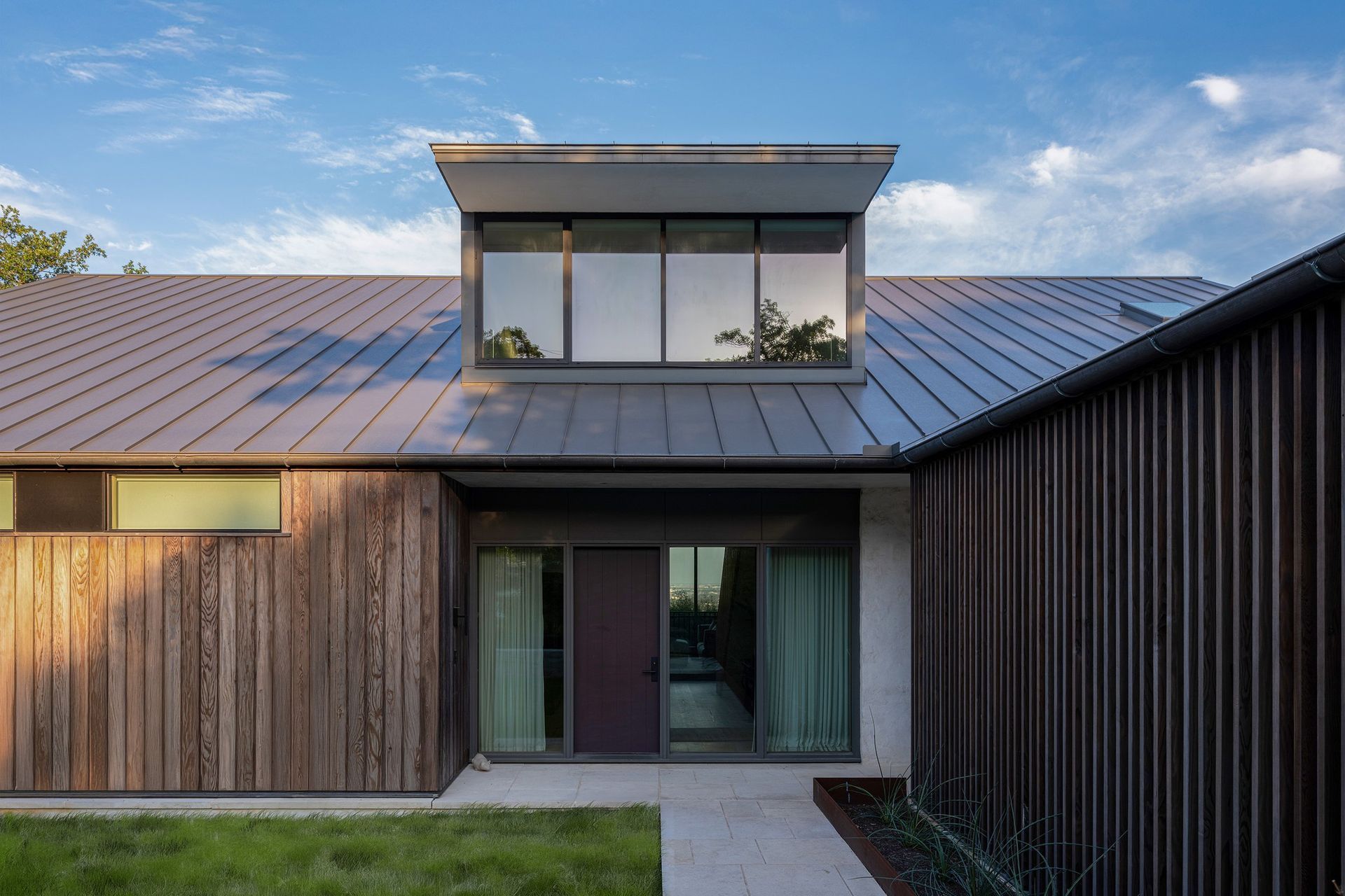 126WestLakeHillsPhoenixCuppettKilpatrickArchitectureandInteriorDesignAustinATXArchitectscustom-home-entry-dormer-slat-screen.jpg