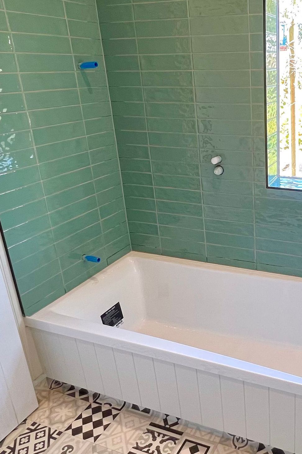 Tiled bathroom floor &amp; shower walls