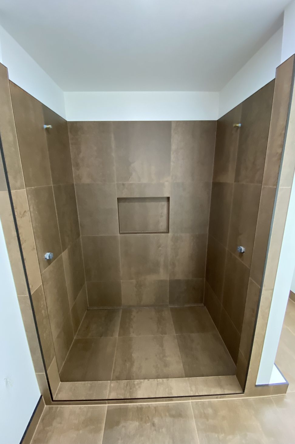 Tiled bathroom floor &amp; shower walls