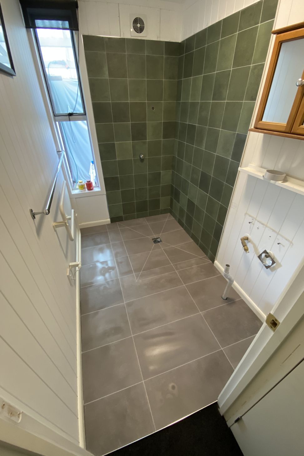 Tiled bathroom floor &amp; shower walls