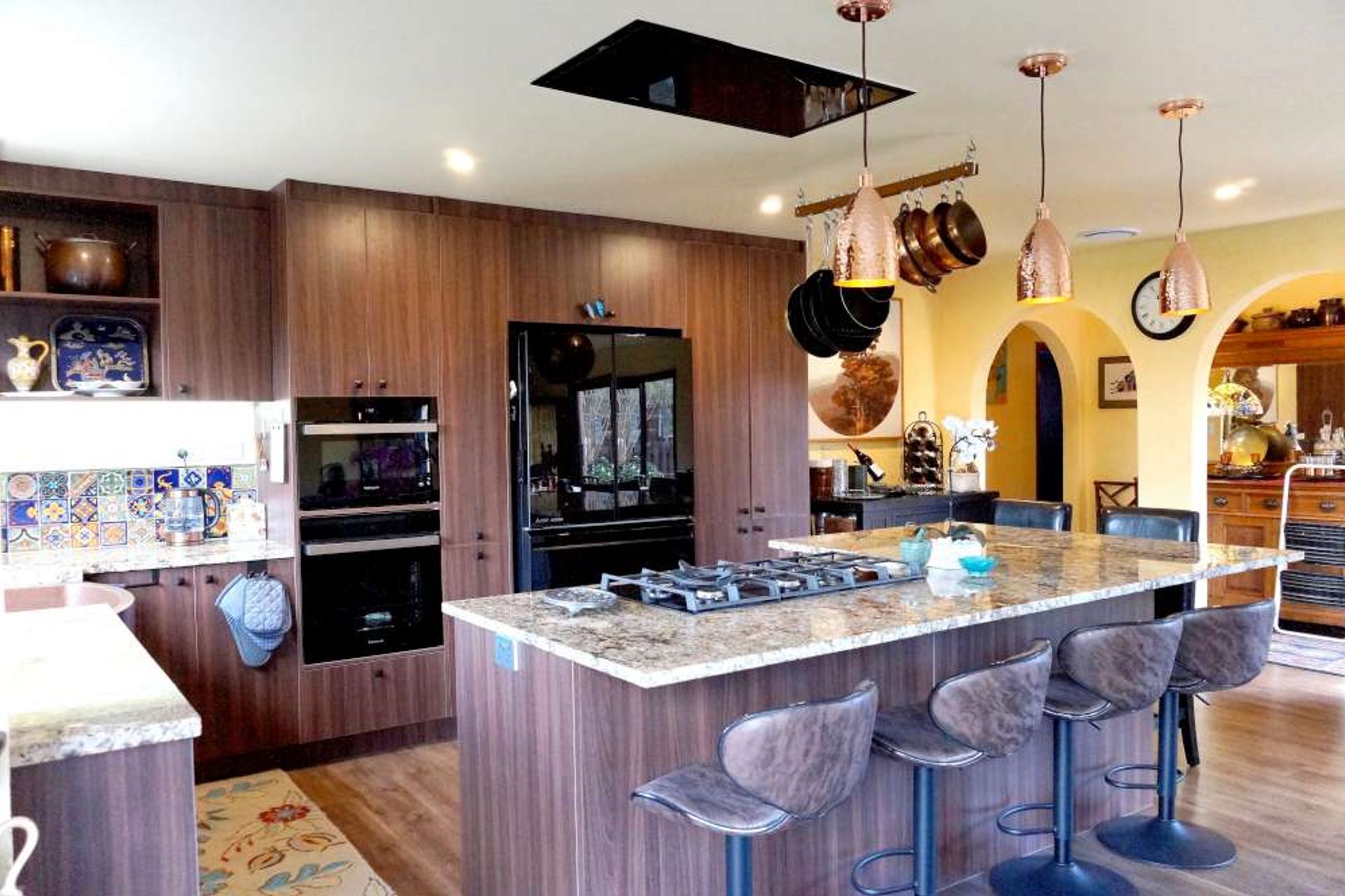 After renovation - The wall between the kitchen and lounge was demolished to create an open space