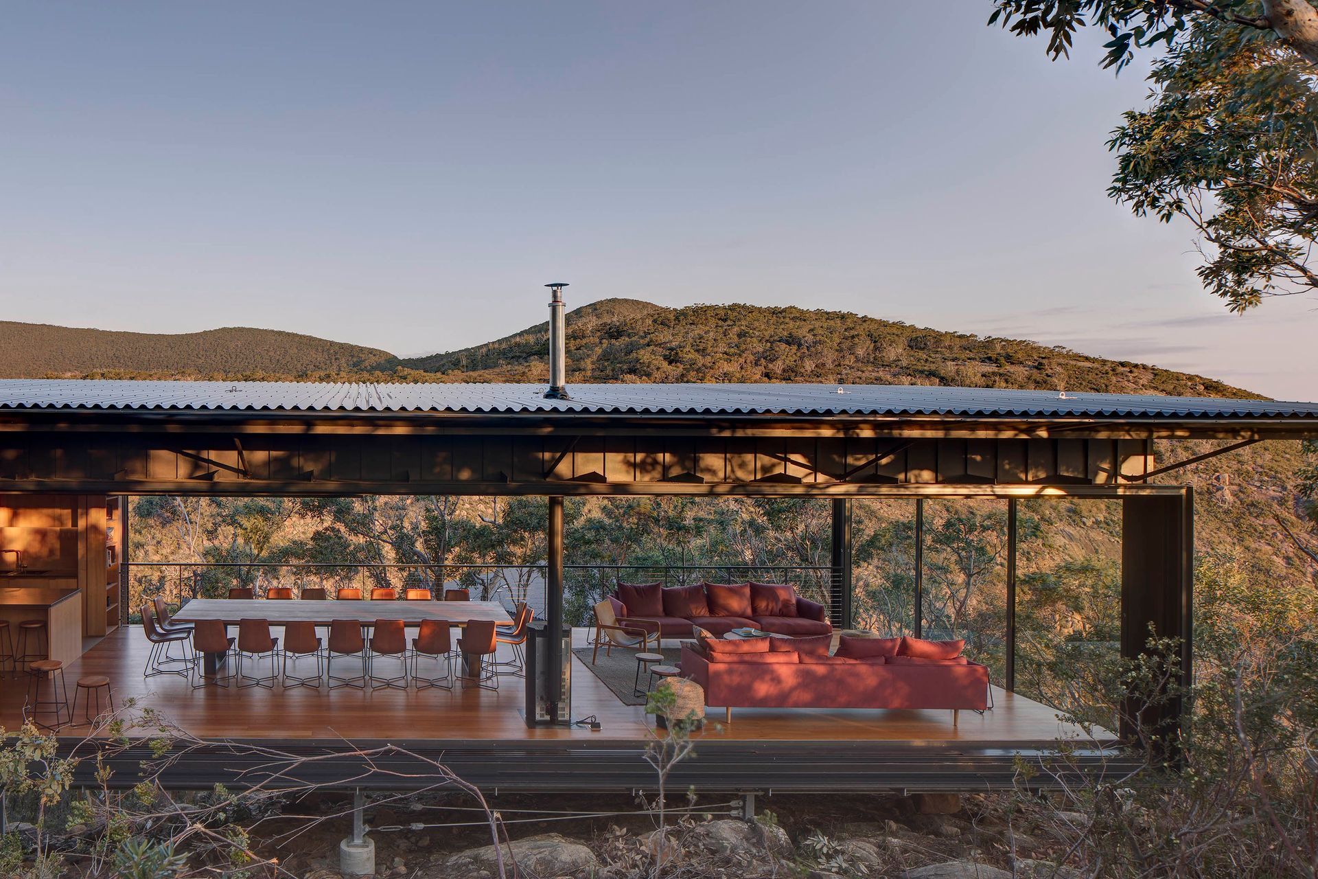 Living spaces open to the adjacent landscape.