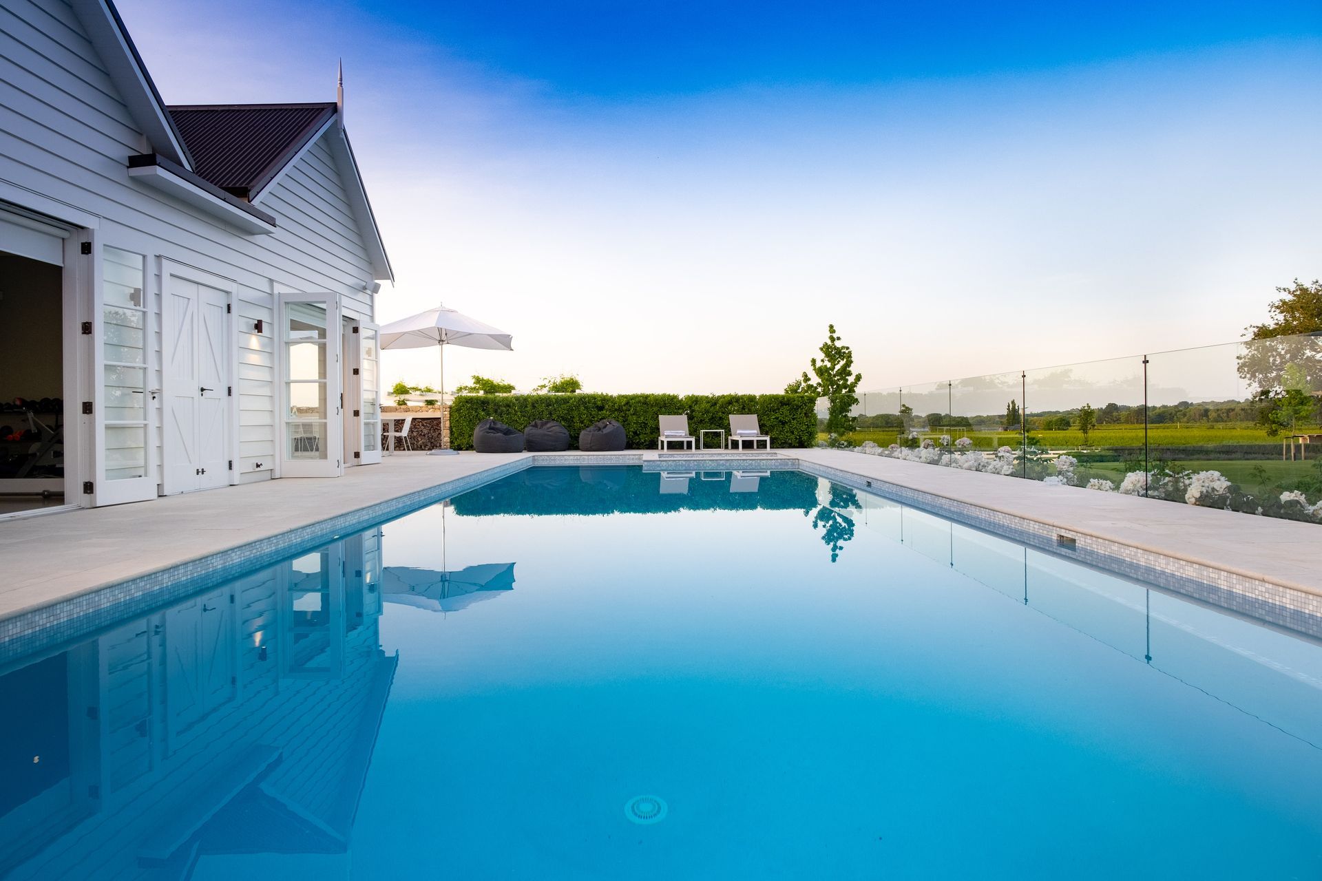 Gym and pool house built from scratch. French doors and detailed exterior doors