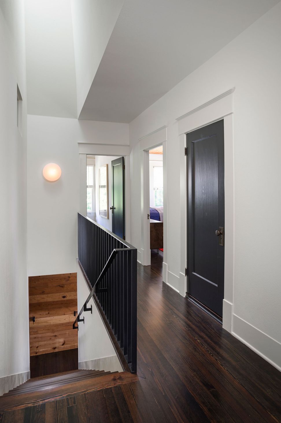 15TransformationinHemphillParkCuppettKilpatrickArchitectureandInteriorDesignaustin-tx-stair-hall-skylight-dark-wood-contrast-1-v2.jpg