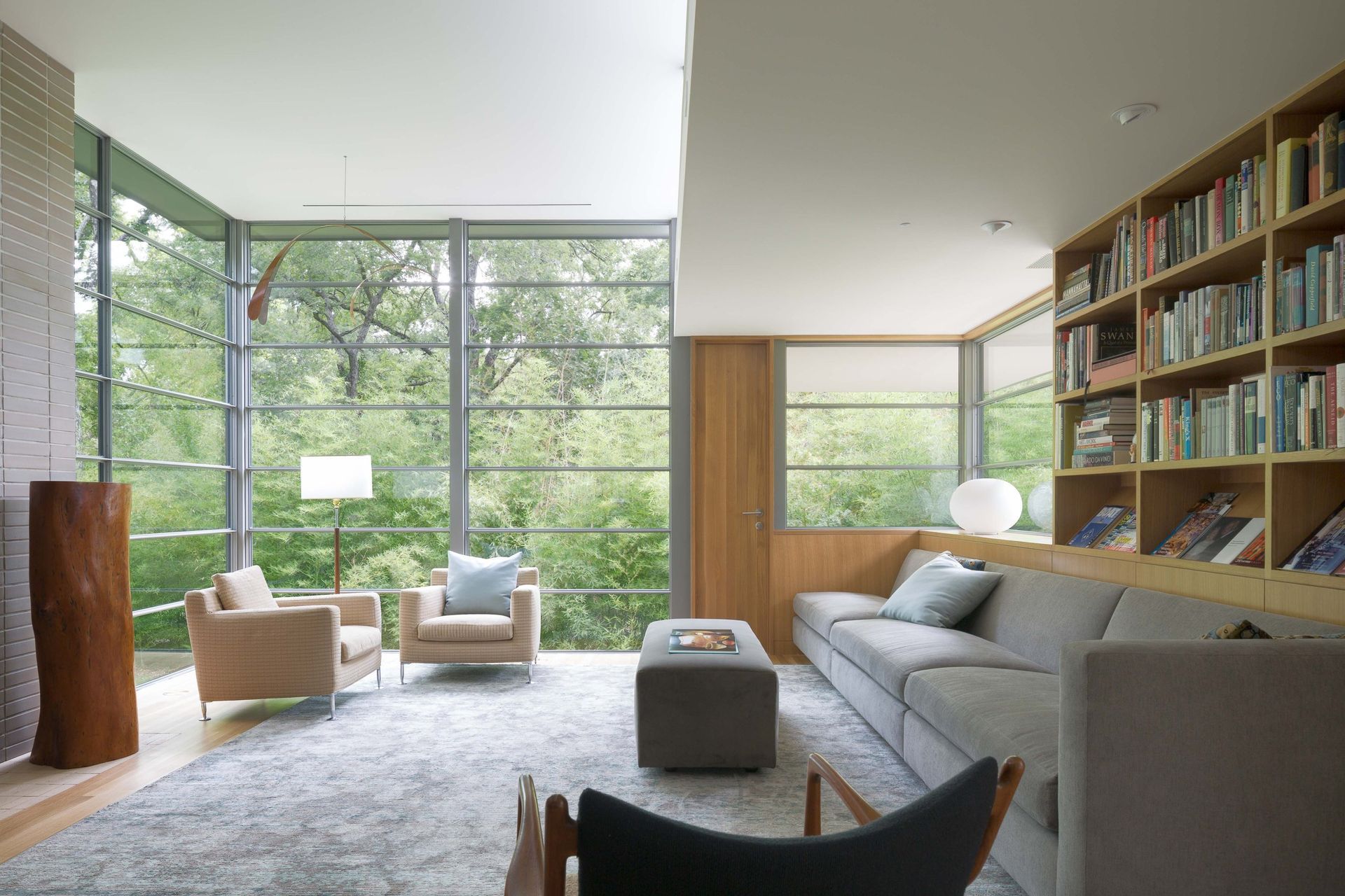 8InwoodPlaceCuppettKilpatrickArchitectureandInteriorDesignoak-finished-room-steel-framed-windows-bright-interior.jpg