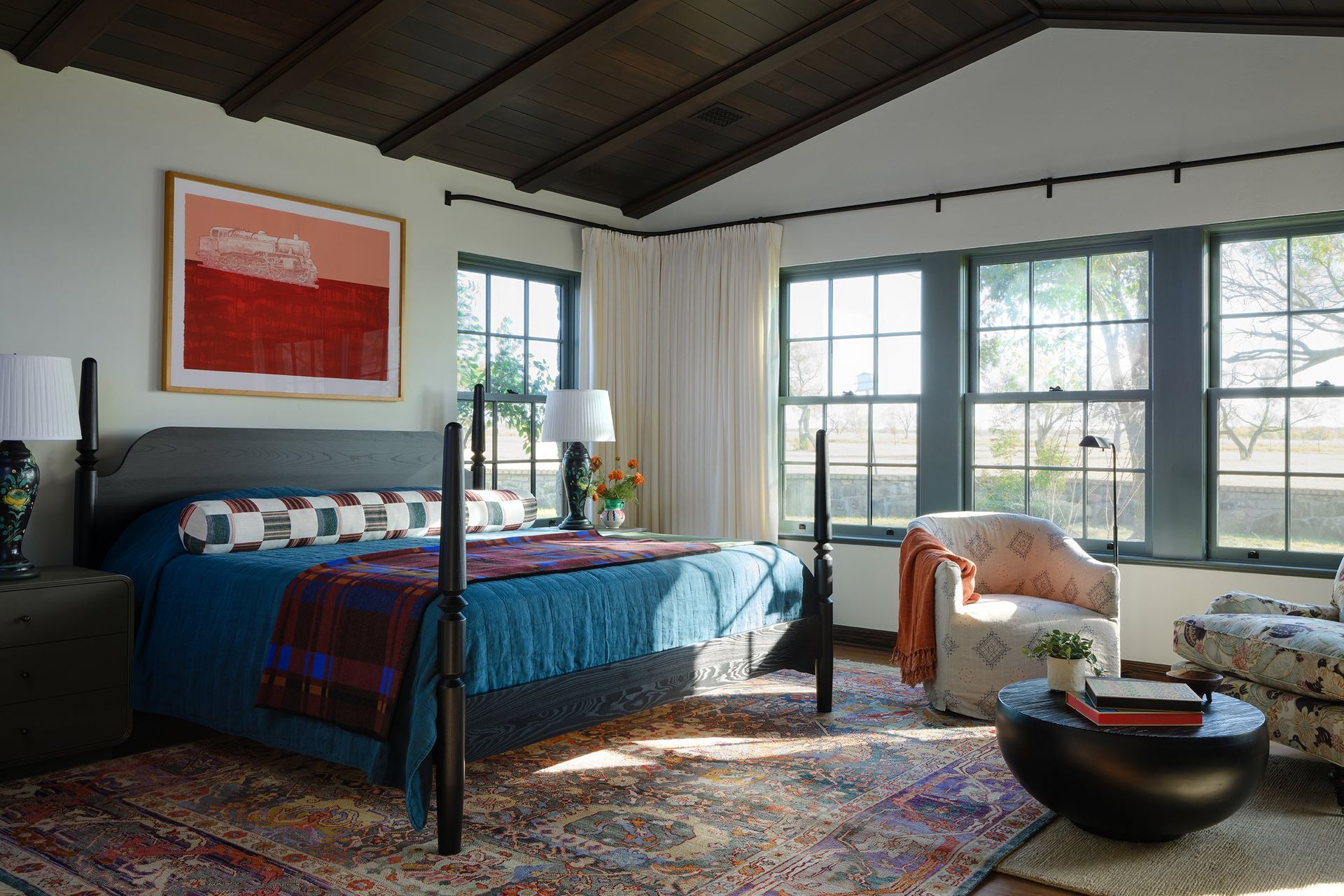 8TexasRanchHouseCuppettKilpatrickArchitectureandInteriorDesignAustinTexasspanish-mexican-colonial-revival-bedroom-wood-beams-interior-design.jpg