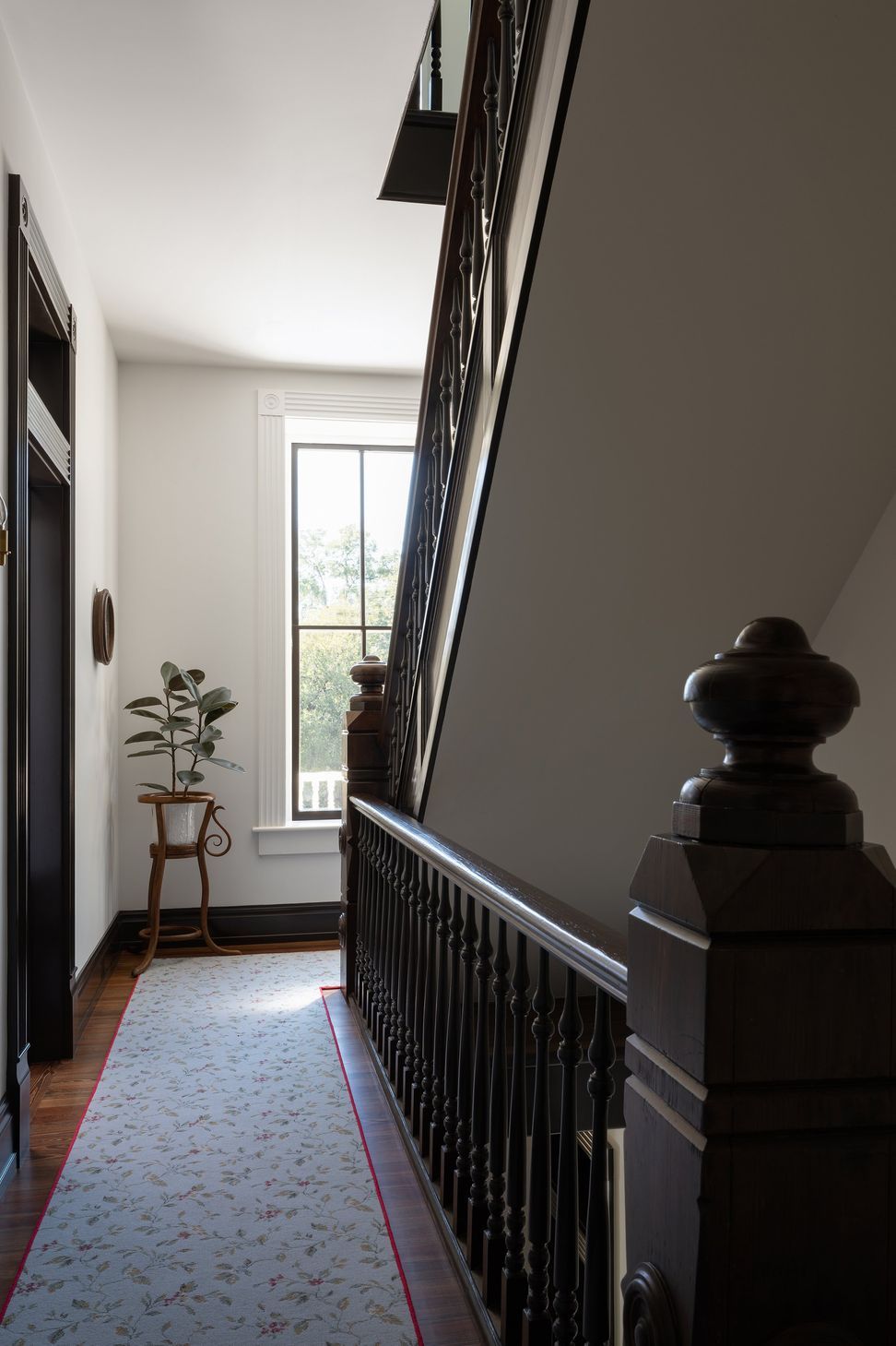 9PastandPresentPlaceCuppettKilpatrickArchitectureandInteriorDesignAustinTexashistoric-stair-hall-newel-post.jpg