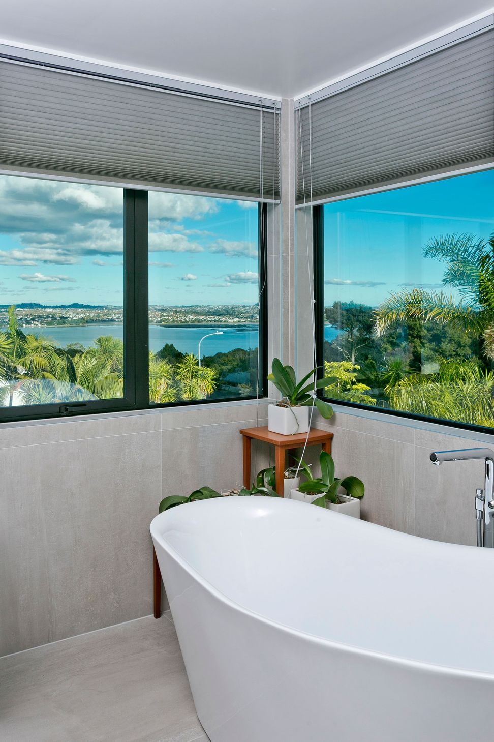 Double aspect windows provide an enviable view back across the harbour, to be enjoyed from the slipper bathtub.