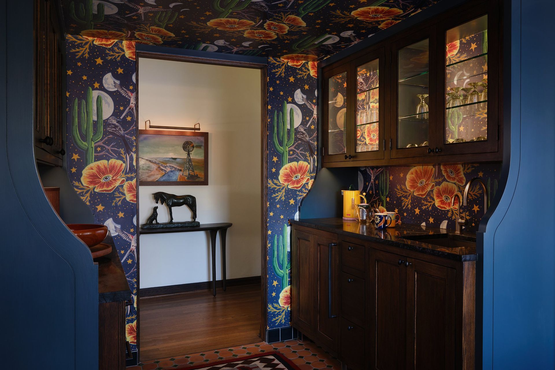 TexasRanchHouseCuppettKilpatrickArchitectureandInteriorDesignAustinTexasspanish-mexican-colonial-saltillo-floor-wild-wallpaper-butler-pantry.jpg