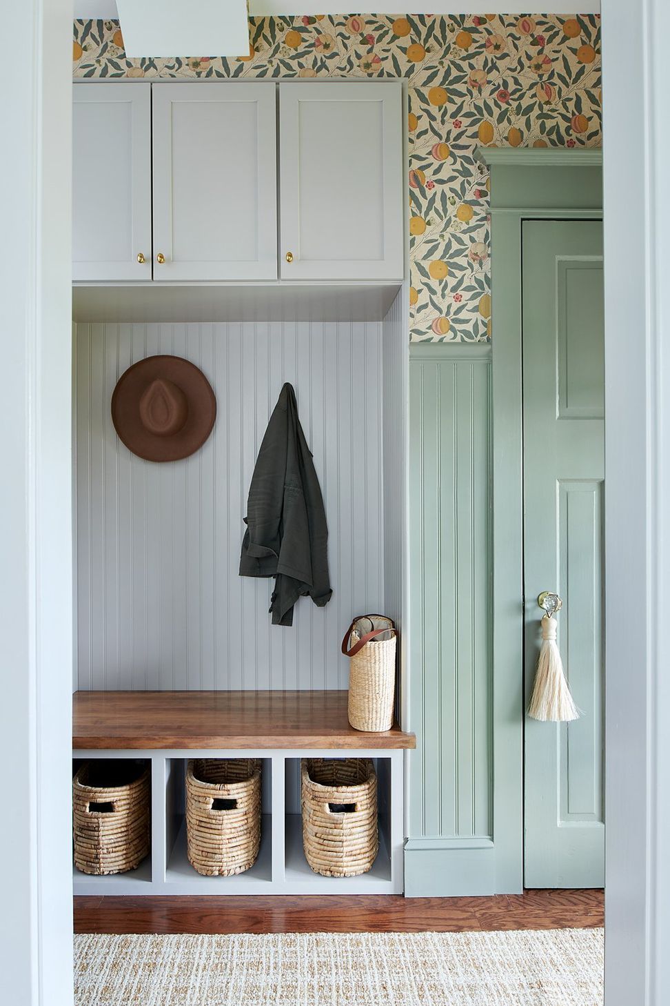 entry-built-in-storage-bench-lemon-green-wallpaper-green-door-sharp-and-grey-interiors-1.jpeg