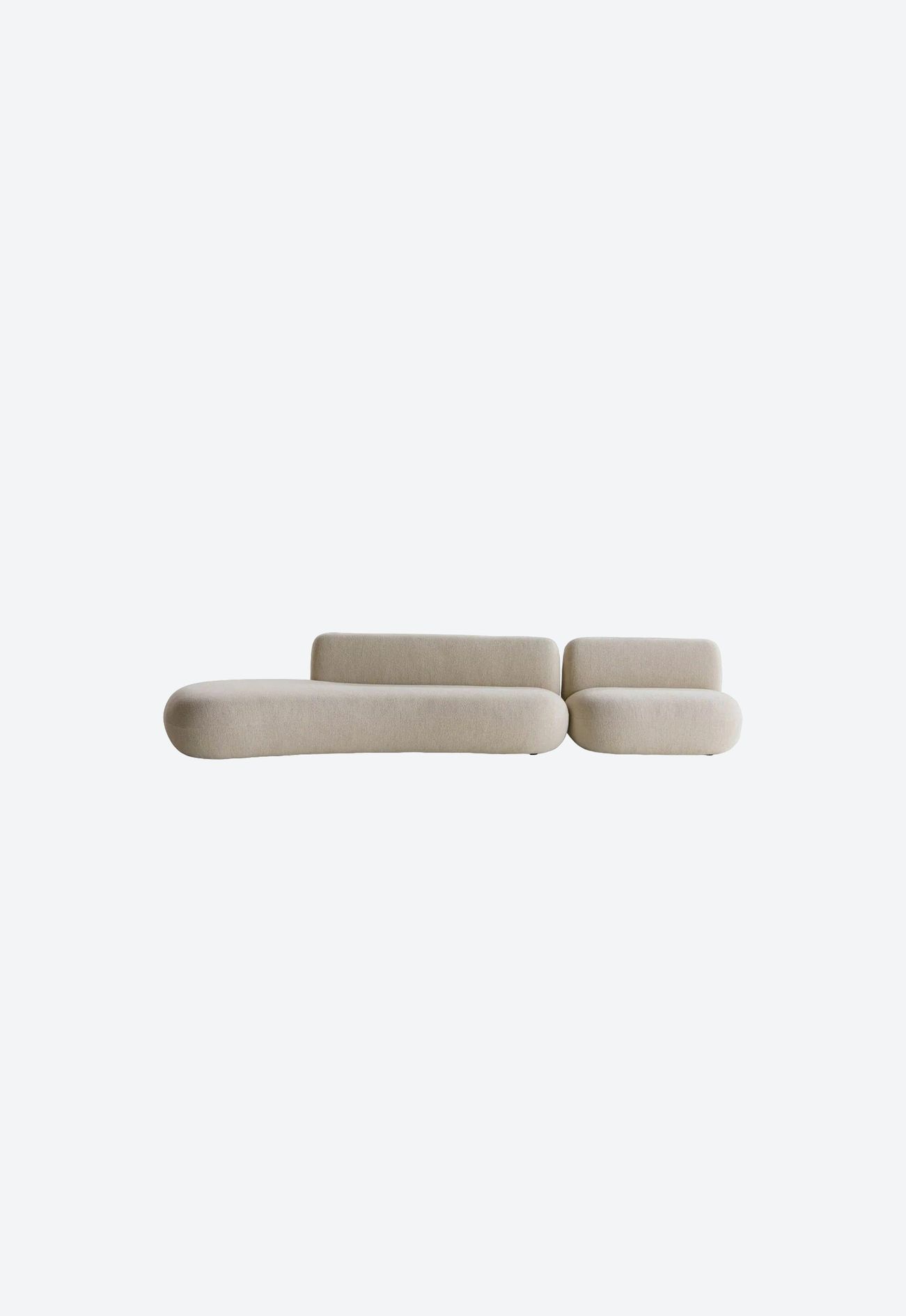 Jade Sofa, Jade is a collection of sofas and tables characterised by sinuous profiles and delicate and organic shapes that echo nature. This collection represents an important step for Potocco in the creation of a more complete offer dedicated to the living space, introducing a new system of modular sofas.