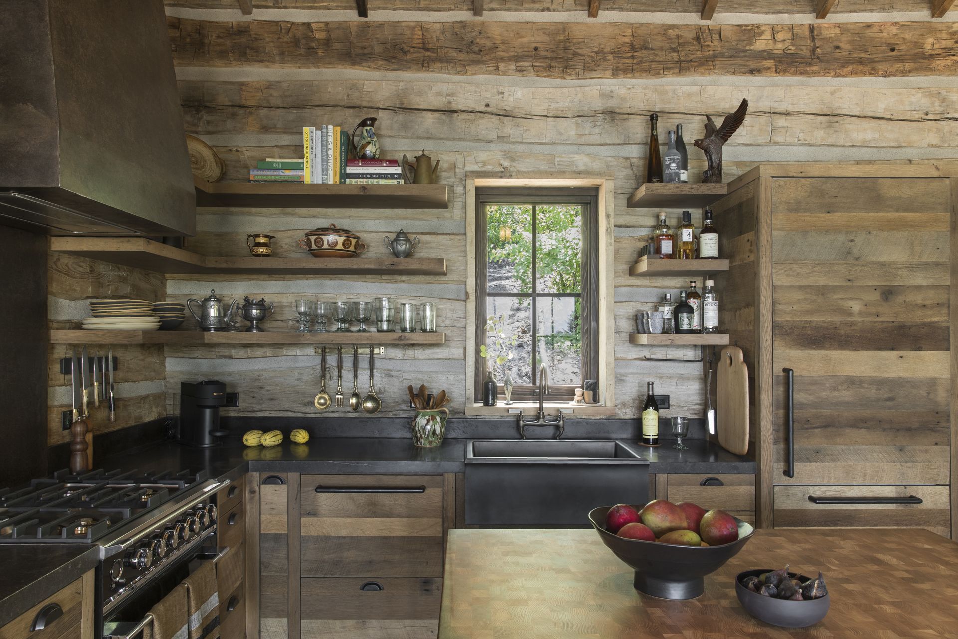 cravotta-interiors-whitefish-kitchen-bronze-venthood-bluestone-reclaimed-oak-montana.jpg