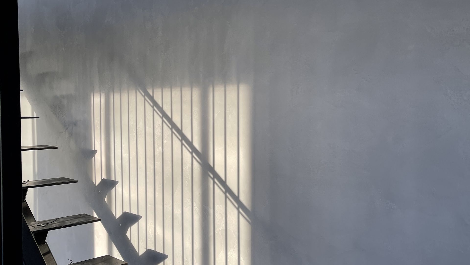 Resistone microcement stairway banner
