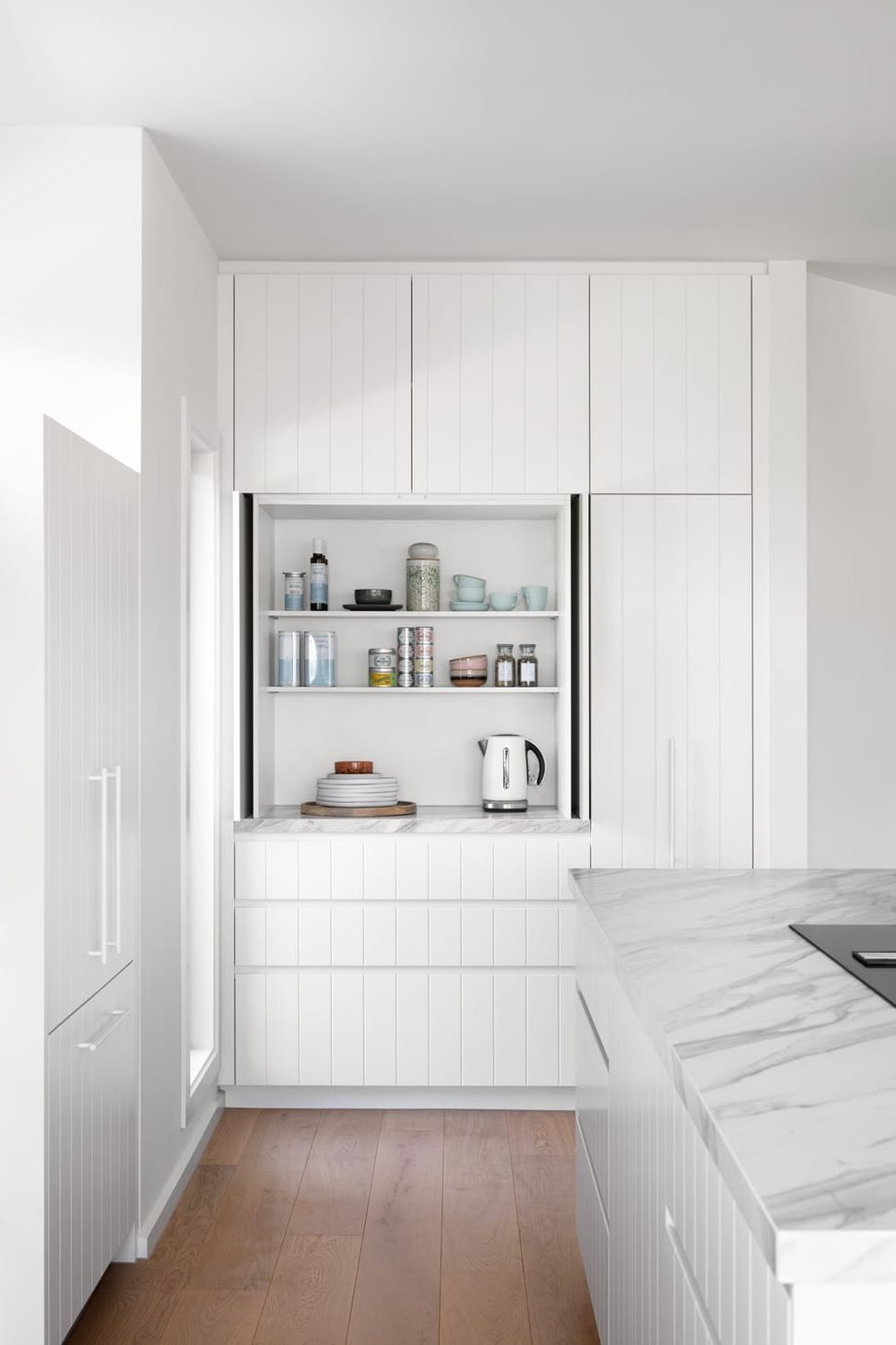 A kitchen breakfast nook for a busy beach house.