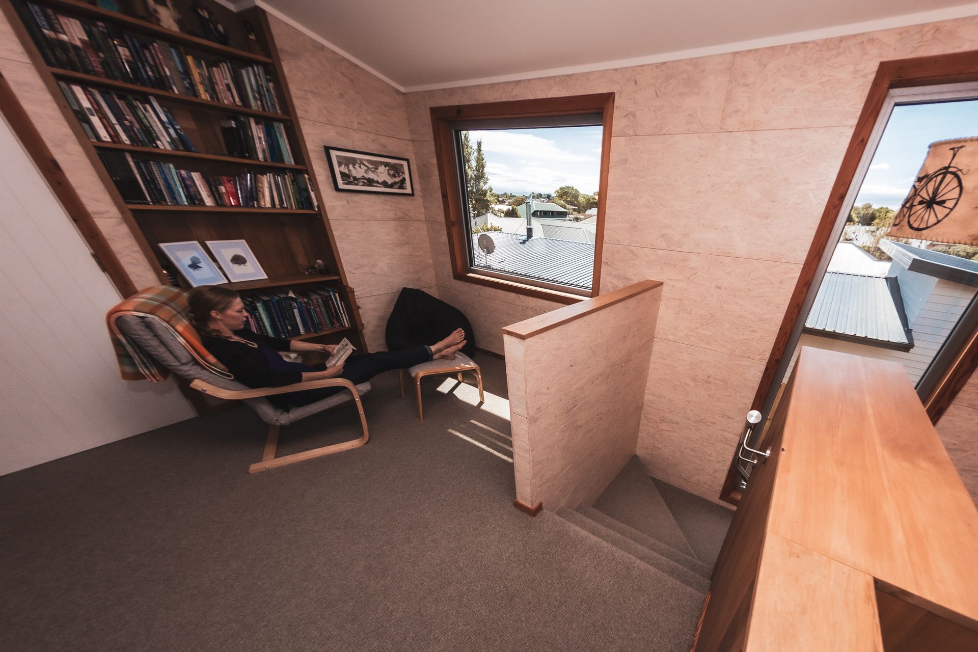 Whitewashed timber internal linings give the feeling of a tramping hut without being overpowering.