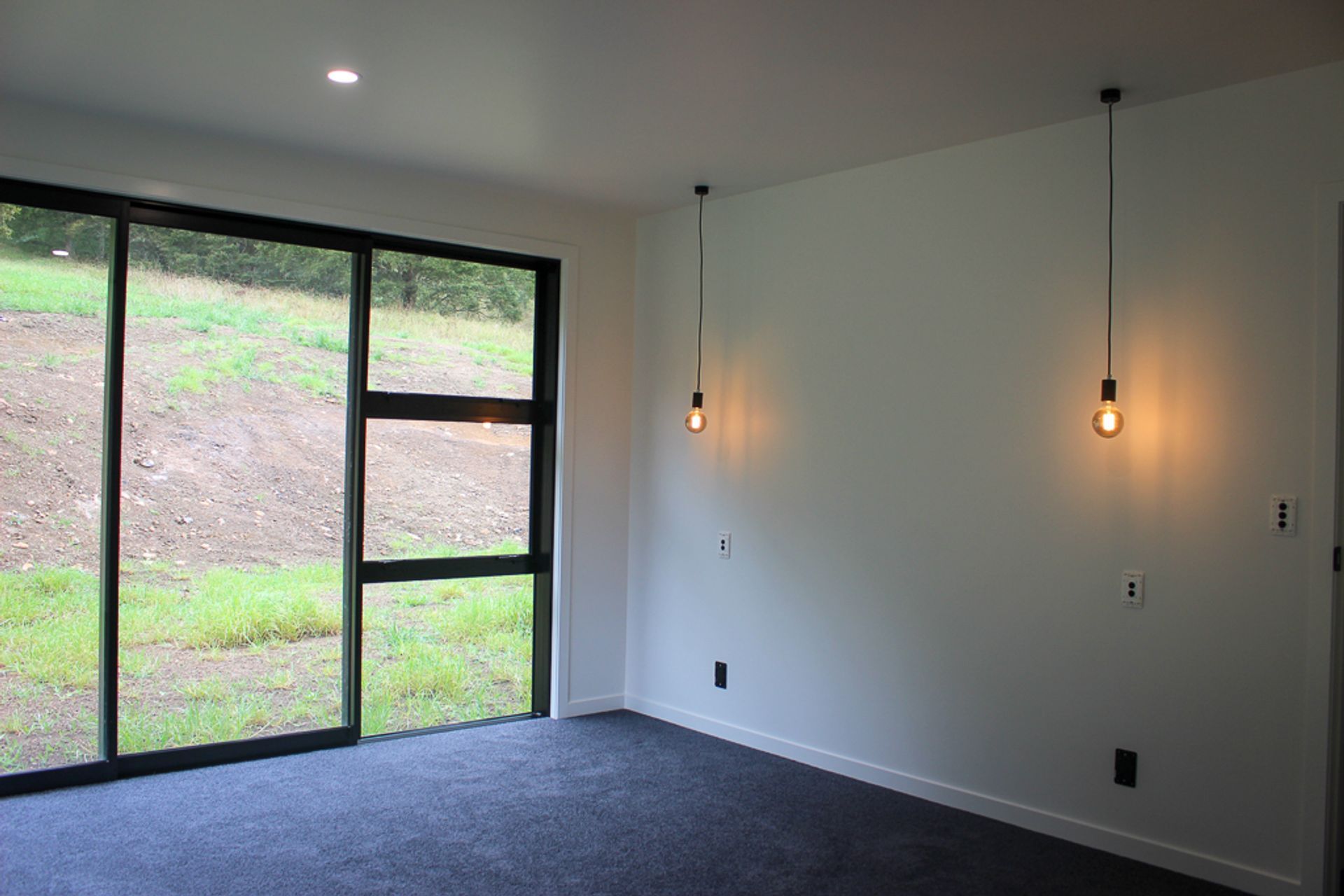 The bedrooms in the build have been kept contemporary and simple.  Full sliding joinery, beautiful wool carpeting and lots of storage for this busy family