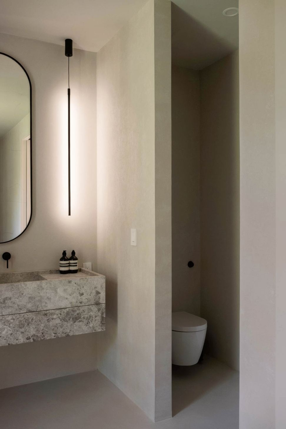 imgi21micro-cement-plastered-minimal-primary-bathroom-interior-design-gigapixel-standard-v2-2x.jpg