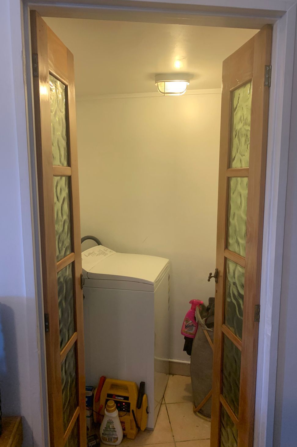 The old, cramped laundry lacked efficiency—excited for a functional and spacious upgrade!
